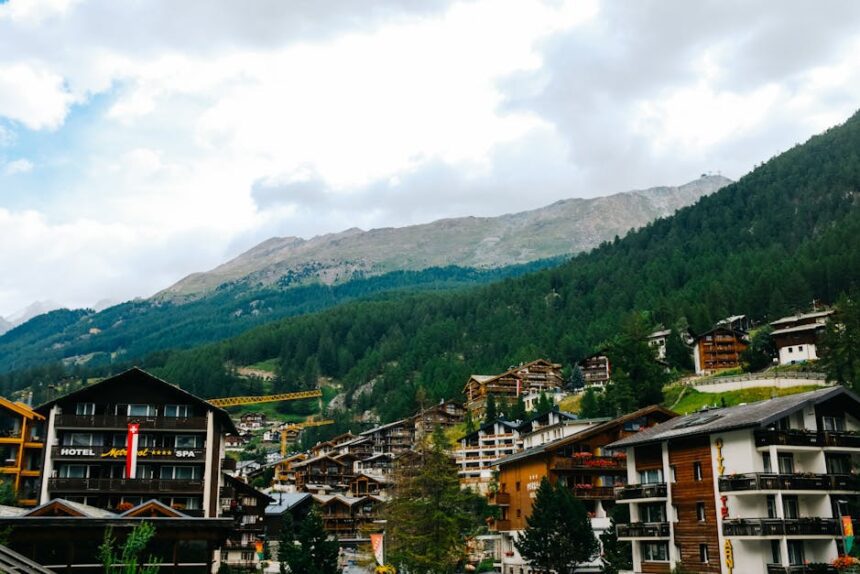 bergkristall oberstaufen - A charming Swiss town with wooden chalets amidst lush forested mountains,
